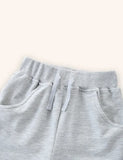 Pantaloncini in cotone con denti di dinosauro