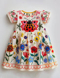 Little Ladybug's Secret Garden Smocked Dress